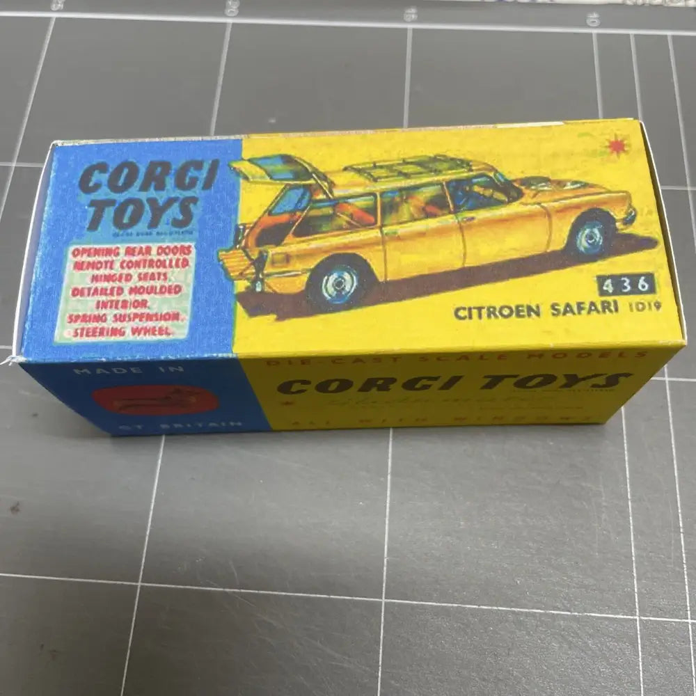 Close-up of Corgi Toys Citroen Safari No 436 Repro Box on tiled floor